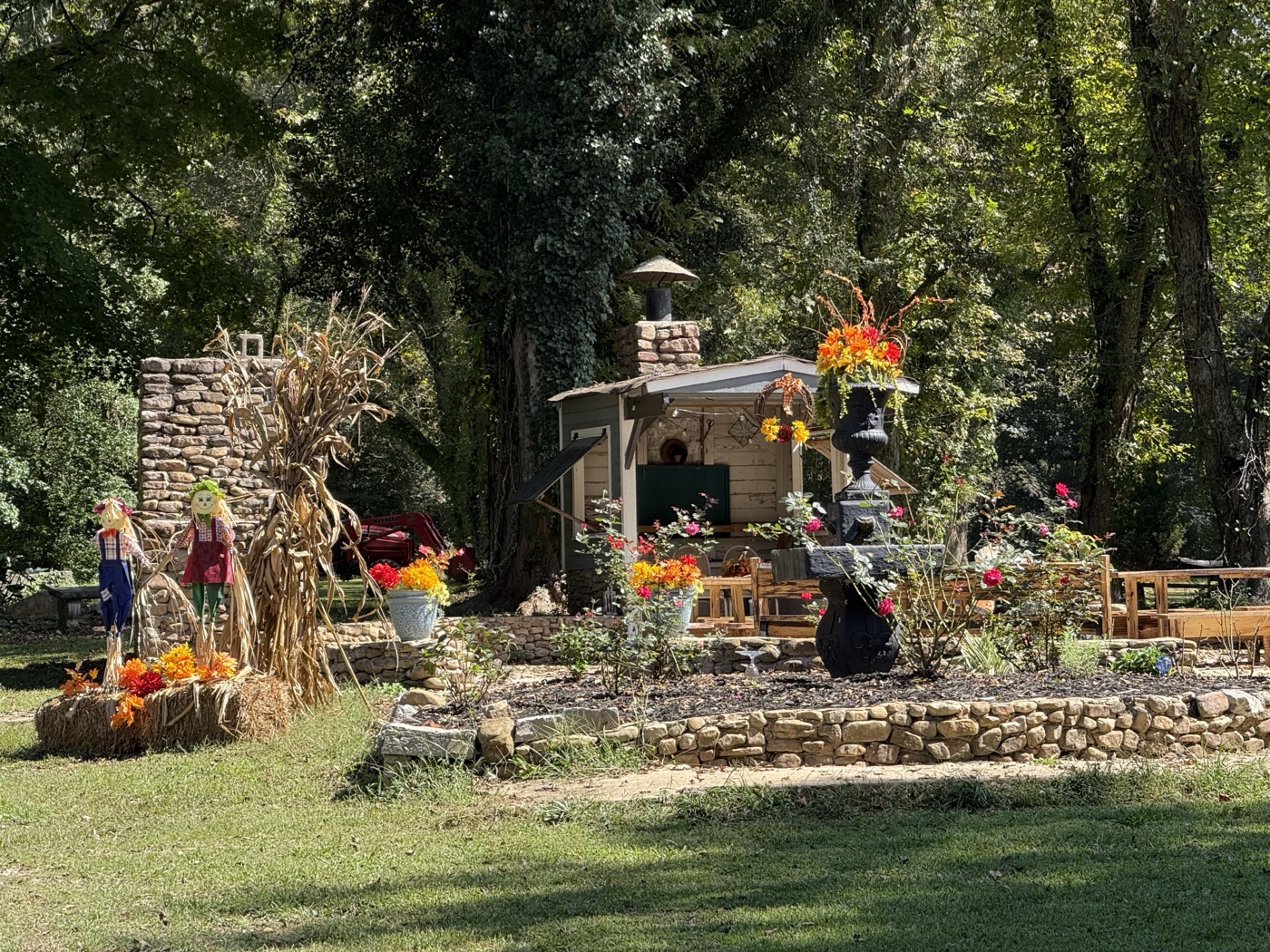 Raulston Woods property grounds with fall decorations and garden