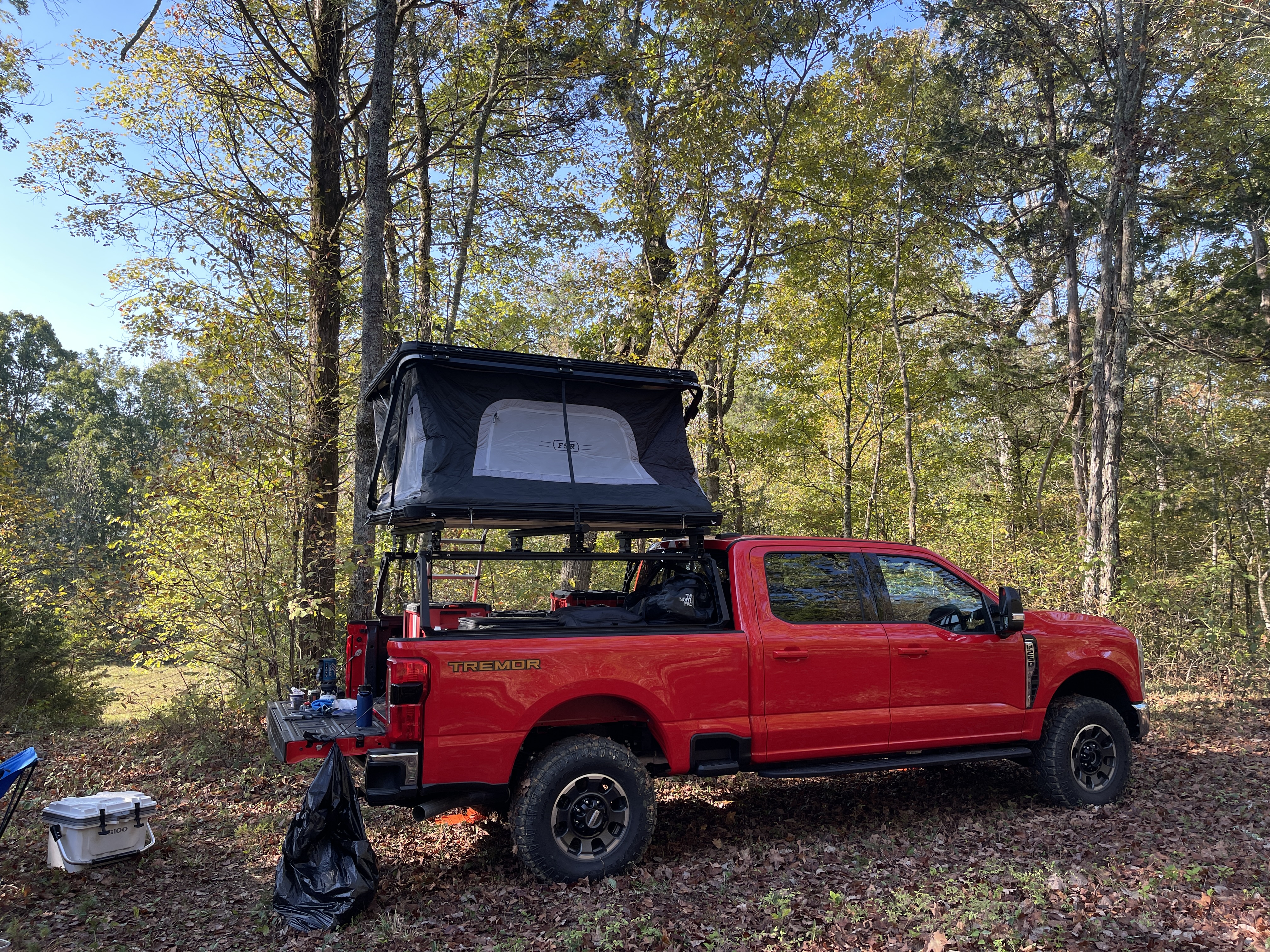 Rooftop tent campsite in the fall foliage at Raulston Woods