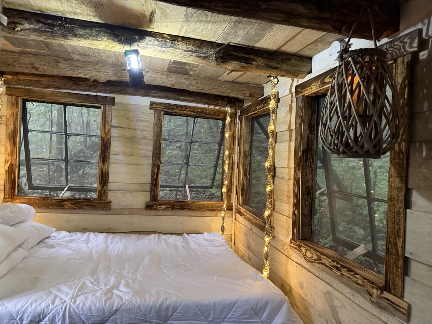 Whispering Falls cabin interior with string lights